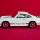 Illustration for article titled Rennsport Reunion: 1/61 Tomica Premium 911 Carrera RS 2.7